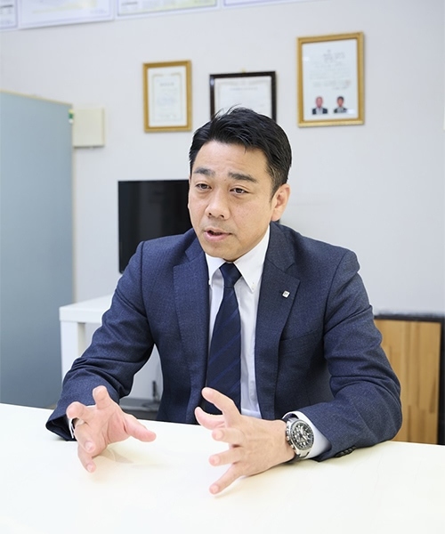 本店店長 河井昌也
